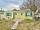 Charming one story home featuring a cozy front yard and well maintained exterior at 503, 509, Cottage, Land 69Th Ave, St Pete Beach, FL 33706