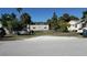 View of property and surrounding neighborhood on a sunny day from street at 503, 509, Cottage, Land 69Th Ave, St Pete Beach, FL 33706