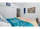 Cozy bedroom with closet and doorway, featuring stylish accents and decor at 5511 Badini Way, Palmetto, FL 34221