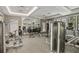 A well-equipped gym features modern equipment, including treadmills, weight machines, and free weights at 5511 Badini Way, Palmetto, FL 34221