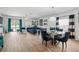Living room showcasing an open-concept layout, tile floors, natural light and access to the pool at 5511 Badini Way, Palmetto, FL 34221