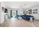 Bright living room features modern decor, tile floors, and plenty of natural light at 5511 Badini Way, Palmetto, FL 34221