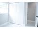 Bedroom featuring a closet with paneled doors and a window at 5625 Gateway Dr, Tampa, FL 33615