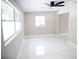 Bright living room featuring recessed lighting, sleek floors, and neutral paint at 5625 Gateway Dr, Tampa, FL 33615