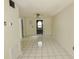Bright living room featuring tile floors, neutral walls, and a ceiling fan at 5736 116Th N Ave, Pinellas Park, FL 33782