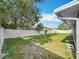 The backyard is surrounded by a new privacy fence at 5808 Silver Moon Ave, Tampa, FL 33625