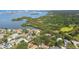 Serene aerial view showcasing the tranquil waters and lush greenery surrounding the neighborhood at 5825 Oakhurst Dr, Seminole, FL 33772