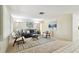 Spacious living room with stylish decor, comfortable seating, and ample natural light, offering a cozy atmosphere at 5825 Oakhurst Dr, Seminole, FL 33772