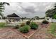 Spacious backyard featuring a gazebo, pool, shed, and well-manicured landscaping at 6409 41St N Ave, St Petersburg, FL 33709