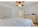 Inviting bedroom with a queen-size bed, ceiling fan, and lots of natural light at 6409 41St N Ave, St Petersburg, FL 33709