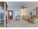 Spacious living room featuring soft carpeting and comfortable seating at 6409 41St N Ave, St Petersburg, FL 33709