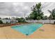 Beautiful pool area with landscaping, a pergola, and ample space for entertaining at 6409 41St N Ave, St Petersburg, FL 33709