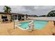 Inviting backyard pool featuring decorative statues and space for lounging at 6409 41St N Ave, St Petersburg, FL 33709