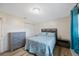 This bedroom features a bed, wooden floors, a window, and a closet at 6639 Winding Oak Dr, Tampa, FL 33625