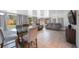 The living room features lots of windows, tile floors, and comfortable seating at 6639 Winding Oak Dr, Tampa, FL 33625