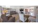 The living room features a table with chairs, tile floors, and comfortable seating at 6639 Winding Oak Dr, Tampa, FL 33625