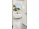 Bright bathroom featuring a modern soaking tub with window views and sleek tile flooring at 710 W Plymouth St, Tampa, FL 33603