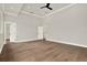 Bright bedroom with hardwood floors, recessed lighting, and updated doors and trim at 710 W Plymouth St, Tampa, FL 33603