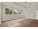 Spacious bedroom with hardwood floors, recessed lighting, and large windows at 710 W Plymouth St, Tampa, FL 33603