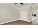 Spacious bedroom with hardwood floors, white trim and a ceiling fan at 712 W Plymouth St, Tampa, FL 33603