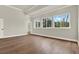 Spacious main bedroom featuring hardwood floors and tons of natural light at 712 W Plymouth St, Tampa, FL 33603