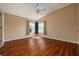 Bedroom featuring hard wood floors and ceiling fan at 7157 Hamilton Park Blvd, Tampa, FL 33615