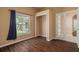 Bedroom with wood-look floors, closet and large window, perfect for restful nights at 7157 Hamilton Park Blvd, Tampa, FL 33615