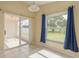 Sun-drenched sun room with access to screened porch at 7157 Hamilton Park Blvd, Tampa, FL 33615