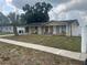Classic single story home with a well-maintained front yard and a welcoming entrance at 7206 Reindeer Rd, Tampa, FL 33619