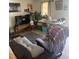 Inviting living room area featuring natural light and comfortable seating arrangements at 7206 Reindeer Rd, Tampa, FL 33619