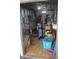 The interior of the shed is filled with boxes and storage items at 7206 Reindeer Rd, Tampa, FL 33619