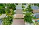 This is an aerial view of the home showcasing well-maintained yards and tree-lined streets at 9852 Laurel Ledge Dr, Riverview, FL 33569