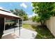 The gazebo on the patio enhances the outdoor space with mature trees and a well maintained lawn at 9852 Laurel Ledge Dr, Riverview, FL 33569