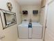 Efficient laundry room equipped with washer and dryer units at 9852 Laurel Ledge Dr, Riverview, FL 33569