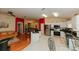 Open living space with kitchen, bar and dining area at 9852 Laurel Ledge Dr, Riverview, FL 33569