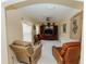 Cozy seating area with comfortable armchairs, built-in media center, and lots of natural light at 9852 Laurel Ledge Dr, Riverview, FL 33569