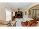 Inviting bonus room featuring tile flooring, media center, and an abundance of natural light at 9852 Laurel Ledge Dr, Riverview, FL 33569