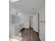 Bright bathroom featuring double sinks, a glass shower, and modern fixtures, providing a luxurious and functional space at 1004 Black Knight Dr, Valrico, FL 33594
