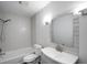 Well-lit bathroom featuring a shower-tub combo, a modern vanity, and contemporary finishes for a clean and stylish look at 1004 Black Knight Dr, Valrico, FL 33594