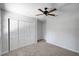 Bright bedroom with carpet and closet, offering a cozy and functional space for rest and relaxation at 1004 Black Knight Dr, Valrico, FL 33594