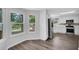 Bright kitchen area features stainless steel appliances and ample natural light at 1004 Black Knight Dr, Valrico, FL 33594