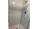 Modern glass shower with white tile and easy access at 105 Lakeview Way # 105, Oldsmar, FL 34677