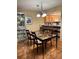 A well-lit dining room adjacent to the kitchen, ideal for entertaining at 105 Lakeview Way # 105, Oldsmar, FL 34677
