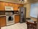 A kitchen with stainless steel appliances at 105 Lakeview Way # 105, Oldsmar, FL 34677