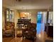 Inviting living room with open access to dining room and plenty of natural light at 105 Lakeview Way # 105, Oldsmar, FL 34677