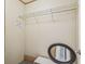 Walk-in closet features shelving and a mirror at 10537 Fran St, New Port Richey, FL 34654
