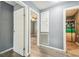 Hallway offering entrances to the bedroom, bathroom, and other rooms of the house at 10537 Fran St, New Port Richey, FL 34654