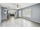 Bright living room with a view into the kitchen space at 10537 Fran St, New Port Richey, FL 34654