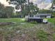 Expansive backyard with an above ground pool at 11107 Riverview Dr, Riverview, FL 33578