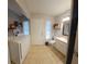 Large laundry room featuring a washer, dryer, utility sink and plenty of storage at 11107 Riverview Dr, Riverview, FL 33578